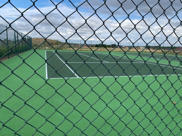 Tennis courts with lines and green markings